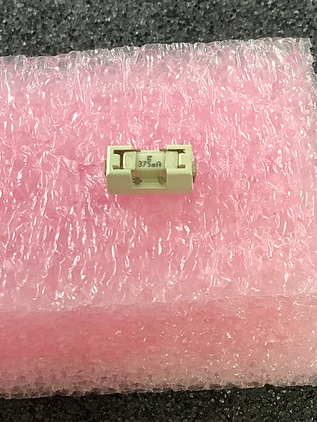 154.375 - LITTLEFUSE - NANO2® >  154 OMNI-BLOK® Fuse and Holder Combination,.375 AMP  Very Fast-Acting Fuse Installed